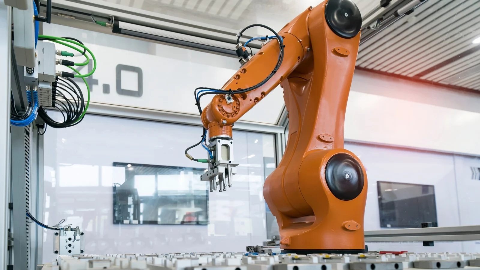 Industrial robot cell illustrating COEFAM focus areas