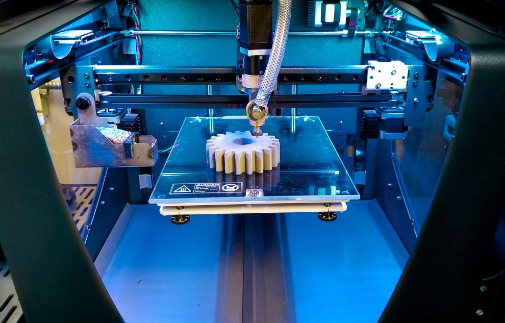 Additive manufacturing 3D printer fabricating a precision gear component